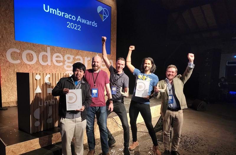 Durable team accepting Umbraco Award with the Codegarden stage behind them